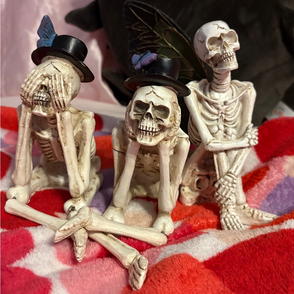 Set of Three Skeleton Figurines with Hats